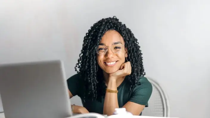 A student at a laptop